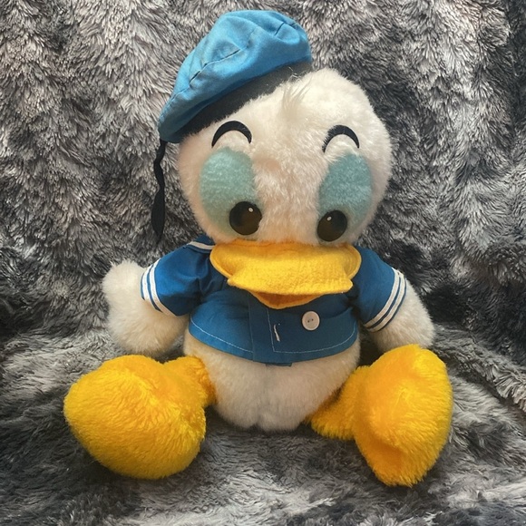 Vintage Donald Duck Plush Toy Doll
Disney Japan Sun and Star RARE
Collectible - Picture 16 of 16